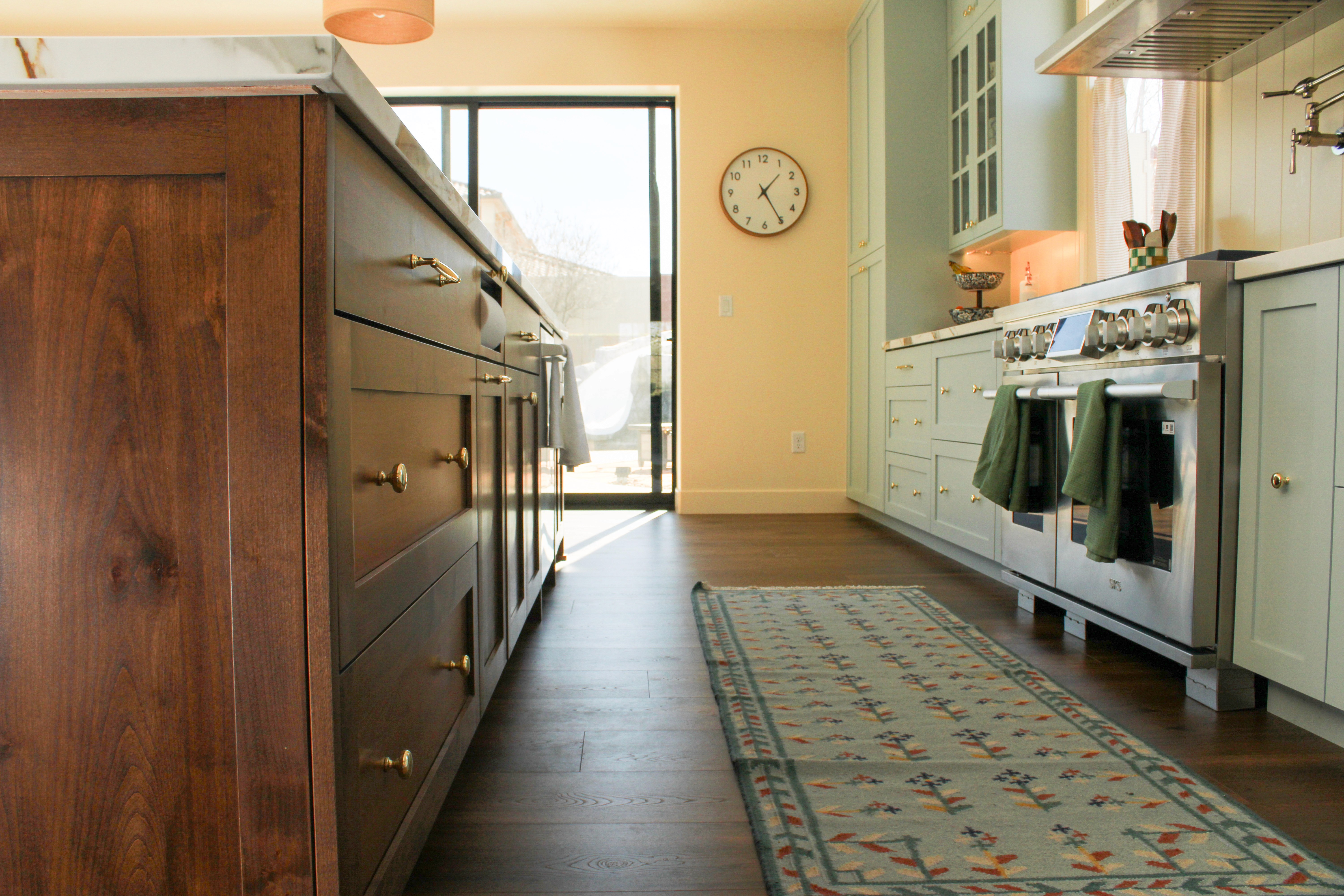 Spacious kitchen remodel in Washington, Utah with blue cabinets and integrated appliances
