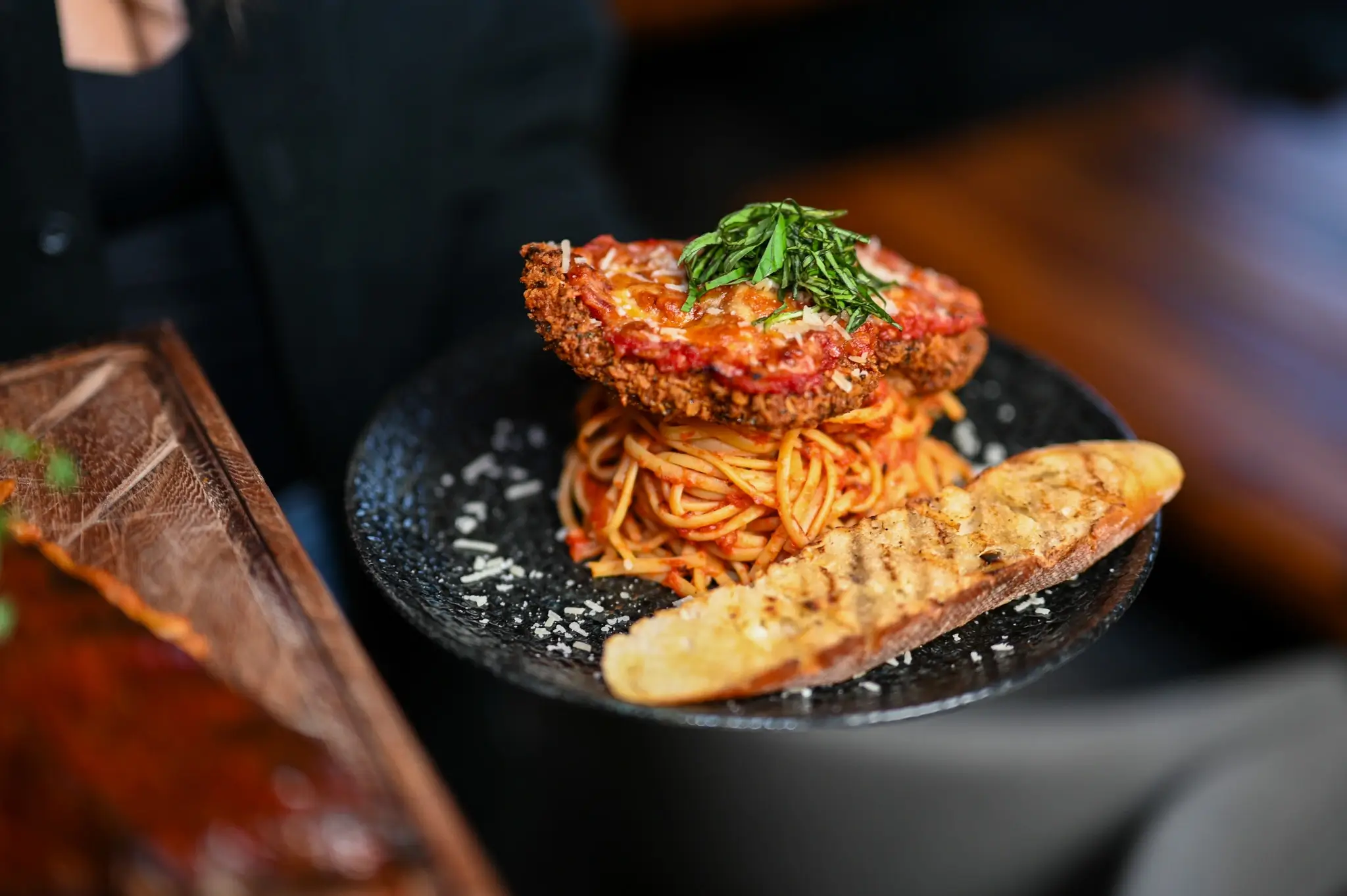 A plate of pasta and bread
