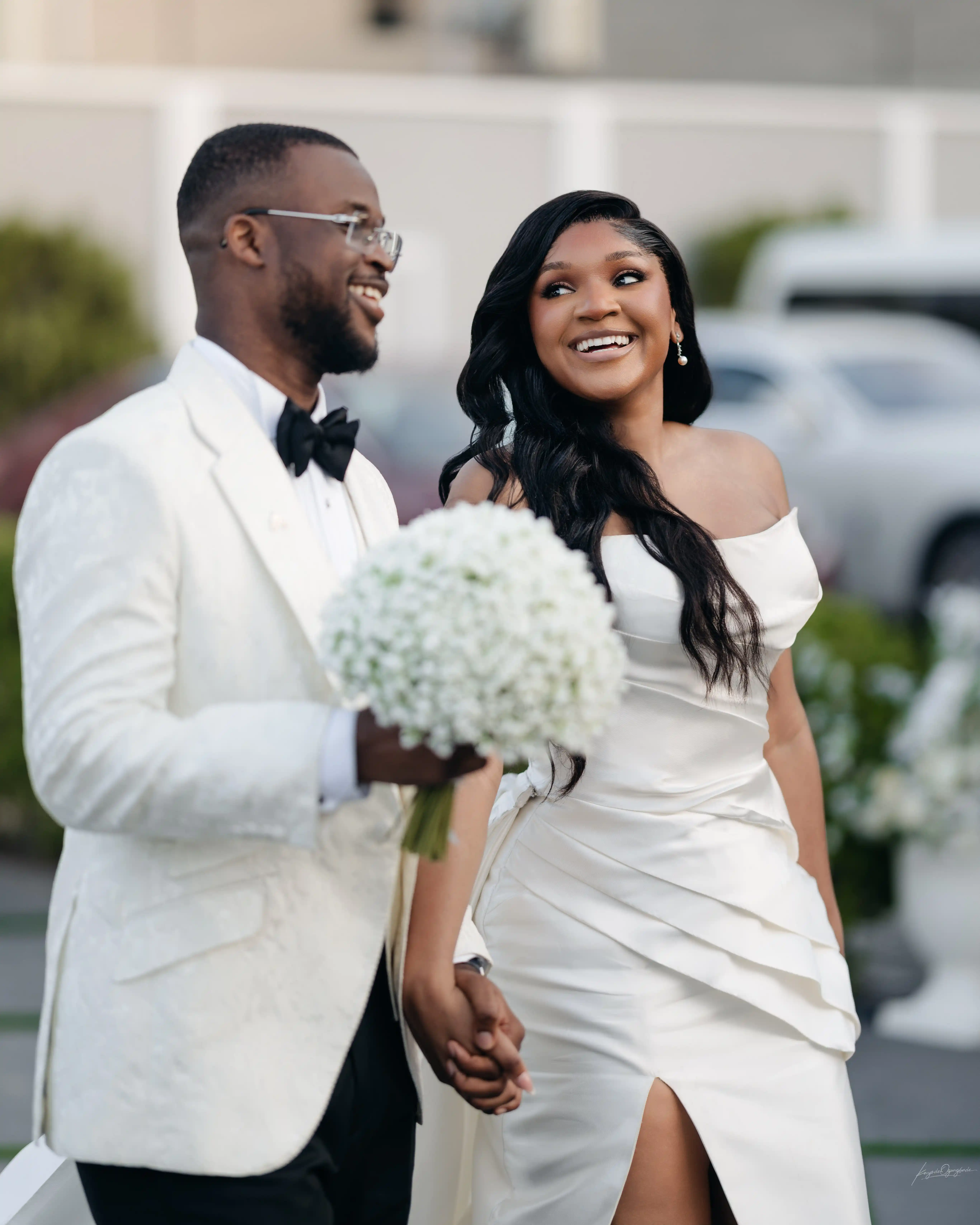 Bride and groom celebrating a luxury wedding coordinated by Victoria Brooks Events, a premium wedding planner in Nigeria.