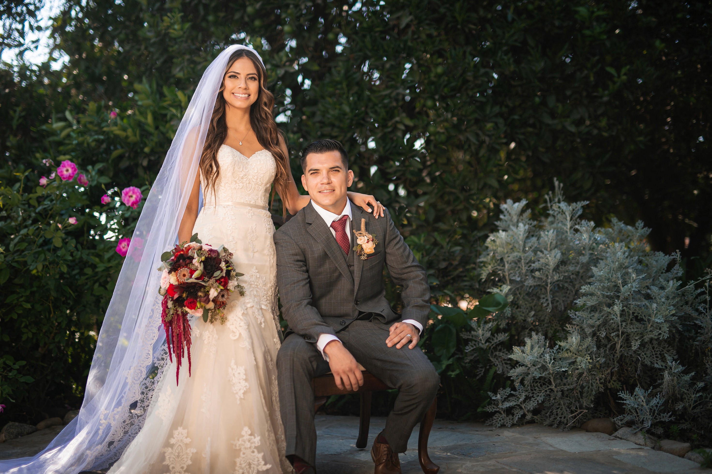 Flat lay wedding details with bouquet, rings, and sparkling bridal heels