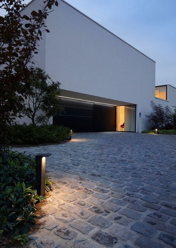 Driveway Lighting to Modern White Home