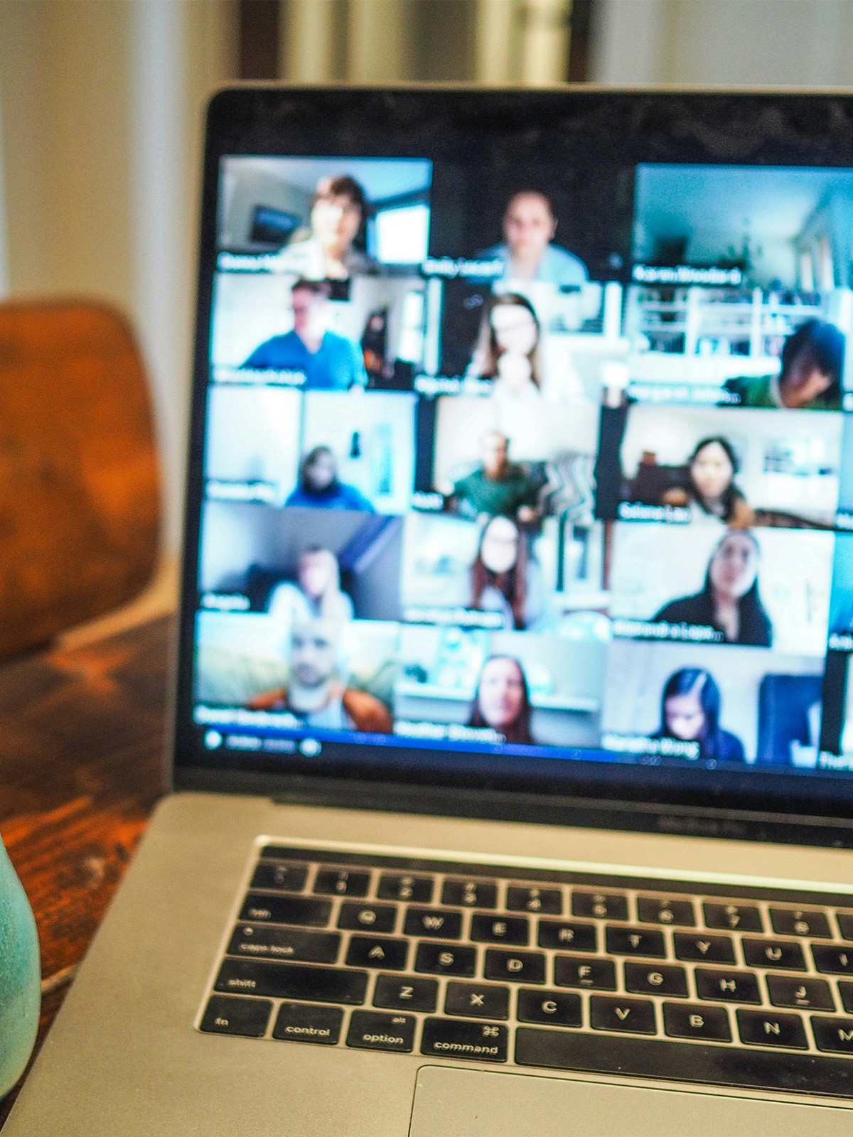 Laptop screen showing meeting over video call