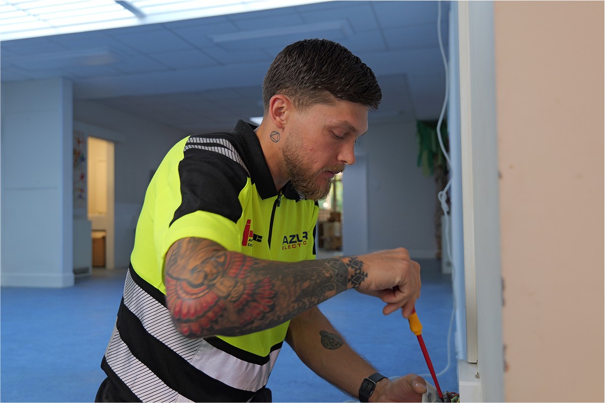 Dean Lee doing some Electrical Work for a school