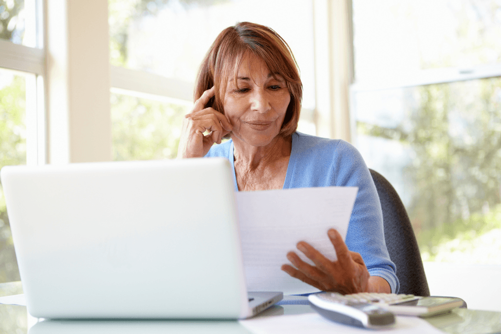 Senior Woman Working at her Desk