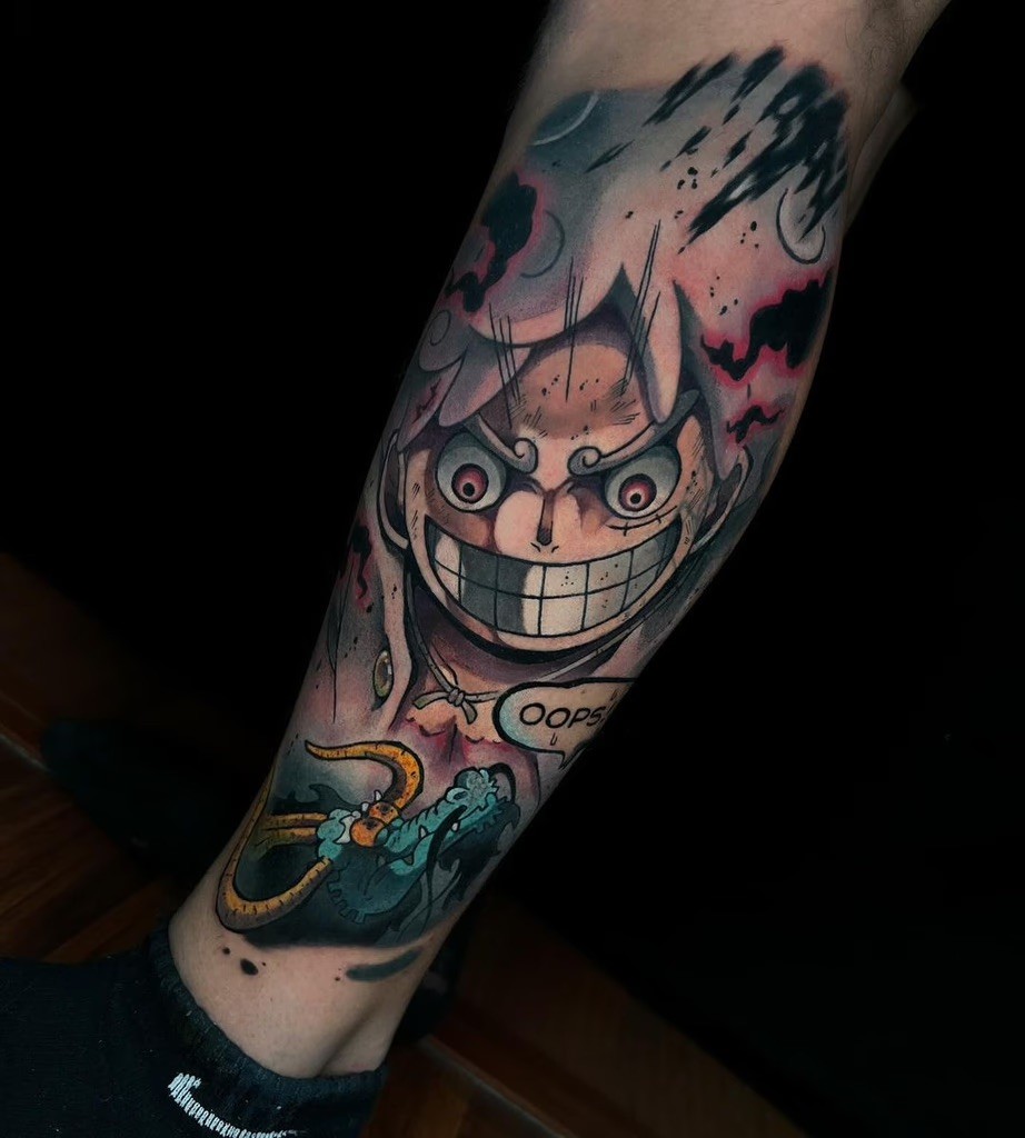 Energetic full-color tattoo of Gear 5 Luffy from One Piece, emphasizing his manic expression and dynamic pose by Leonardo Ortiz