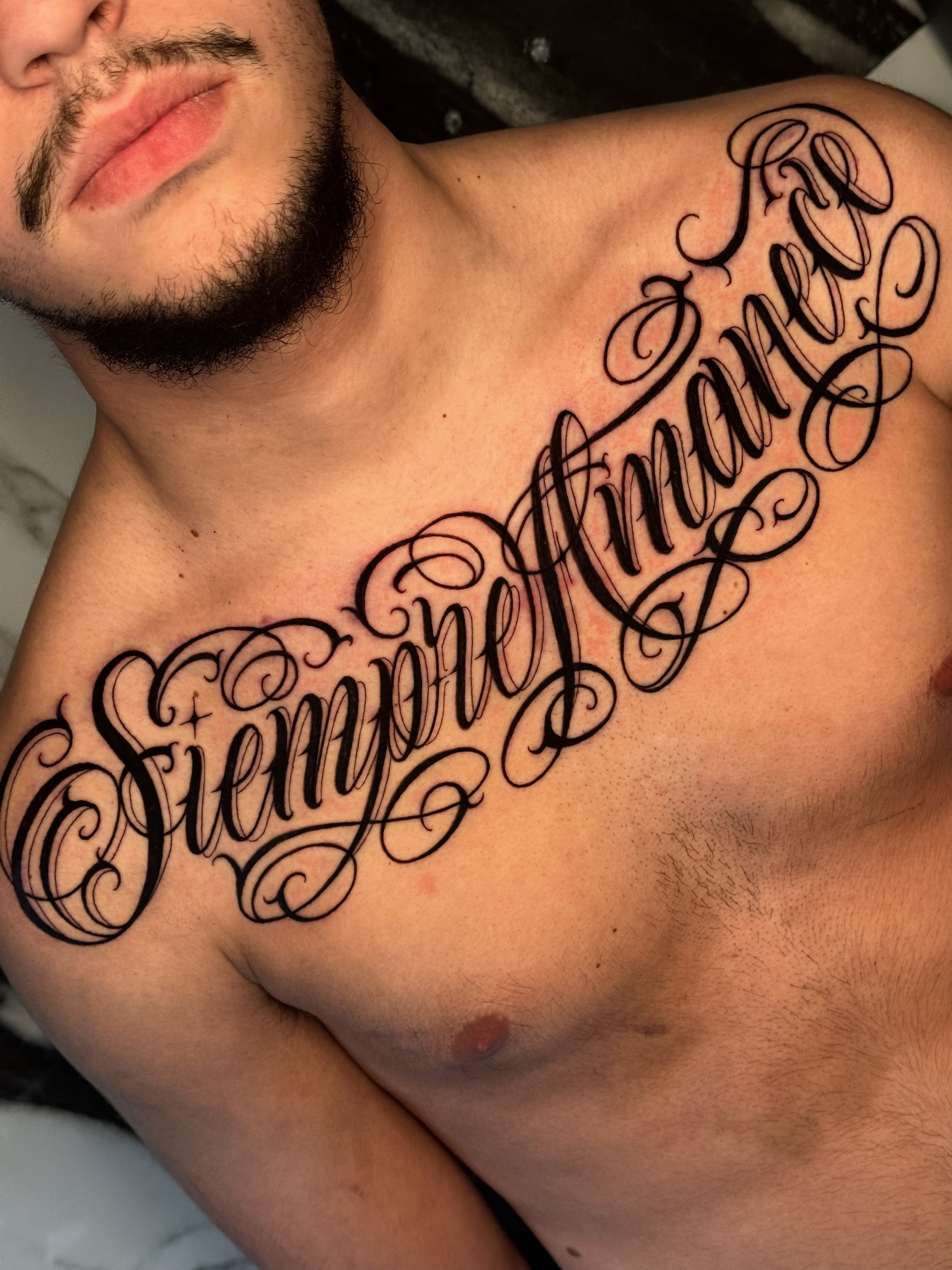 tatuaggio sull'avambraccio in stile chicano