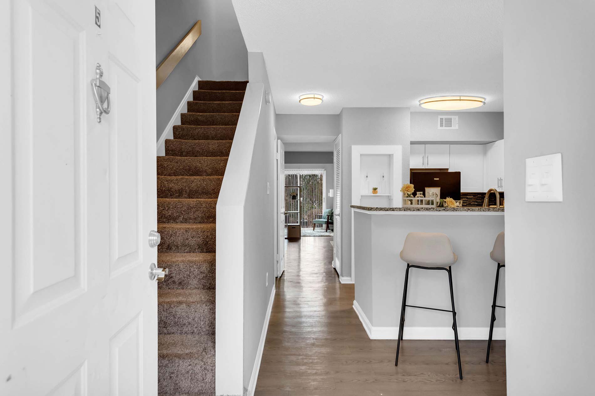 Staircase and Dining Area