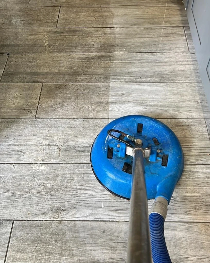 Vacuum cleaner on a beige carpet.