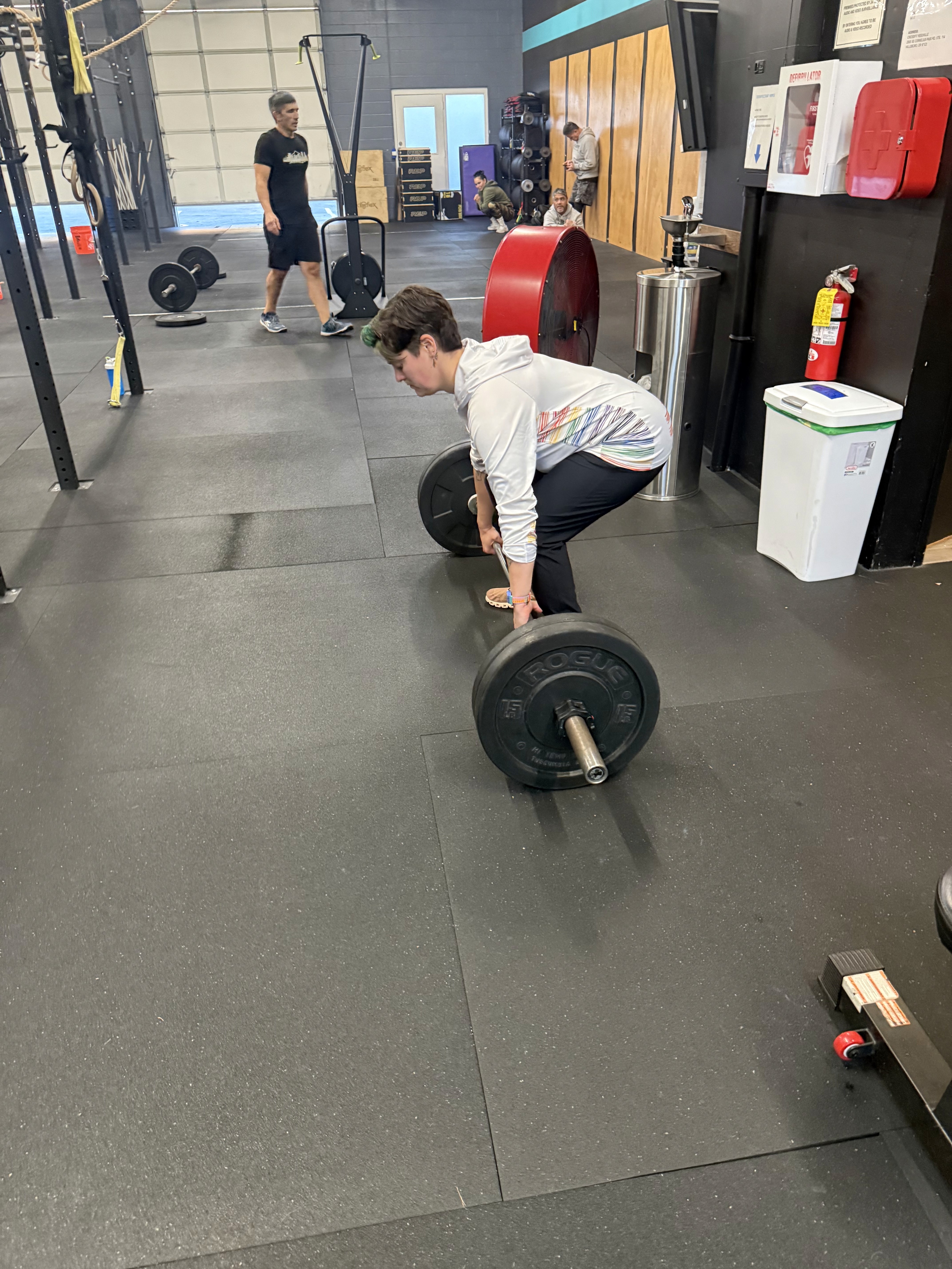 Hypermobile person deadlifting