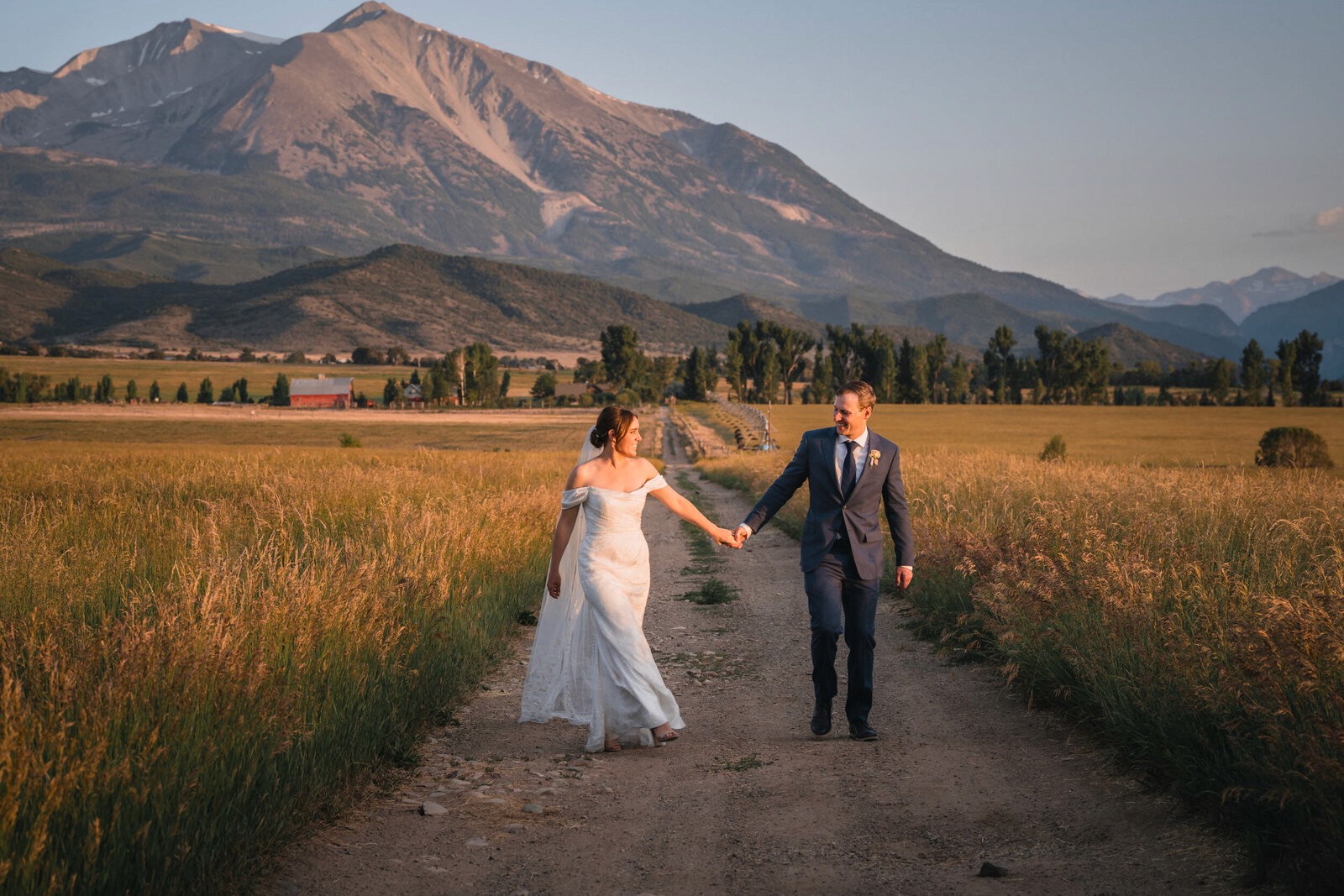 Andy and Amber walking beneath Mount Sopris