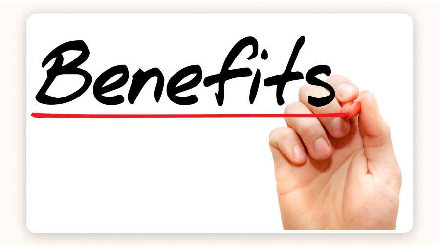 Hand highlighting the word “Benefits”