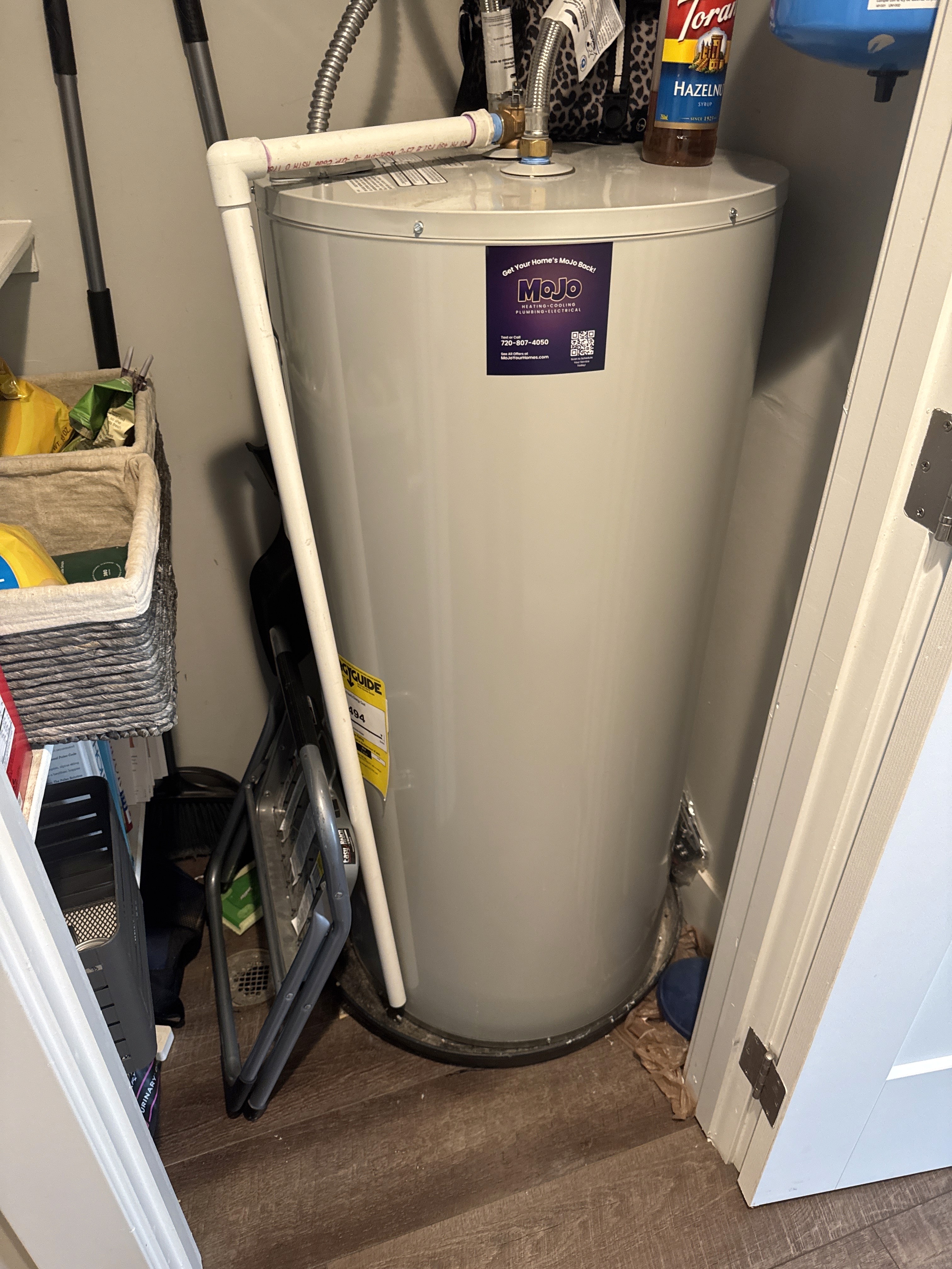 The image shows a Bradford White electric water heater. 