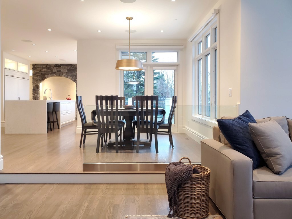 Image of KHD Homes interior design with dining area, furniture, and kitchen in modern home layout design.