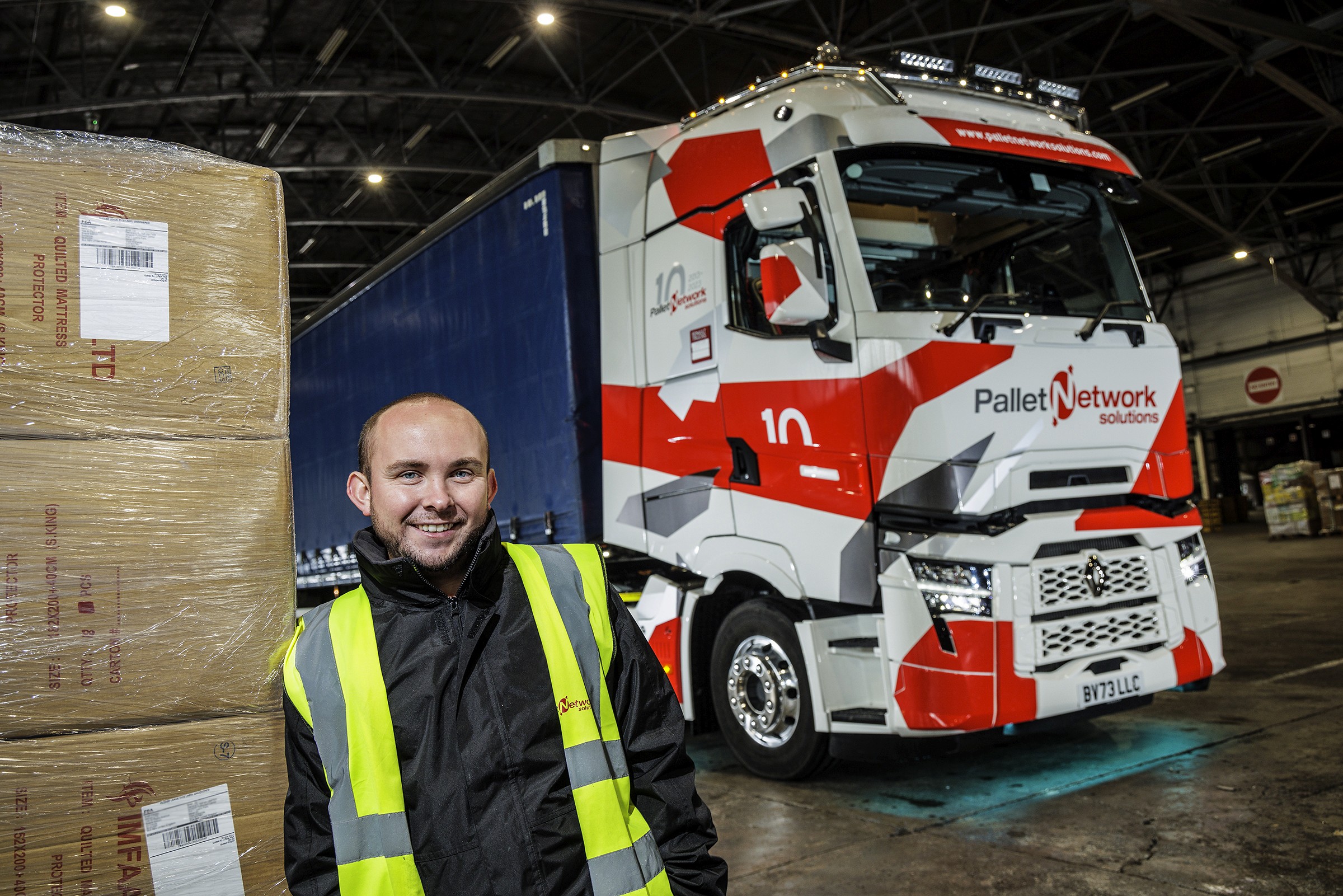 Hughes Price Walker team meeting in an office, representing collaboration and workplace culture.