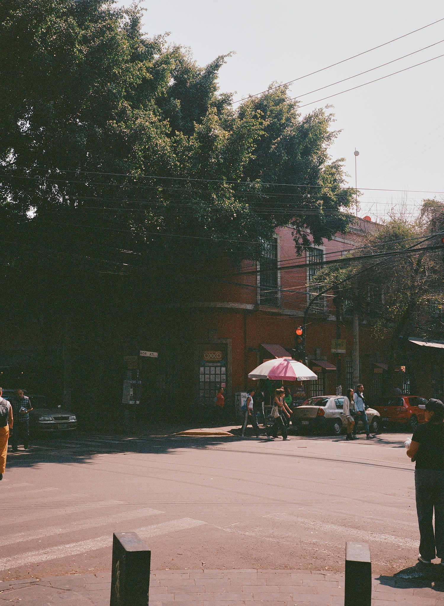 Woman with red hair covering mouth with hair