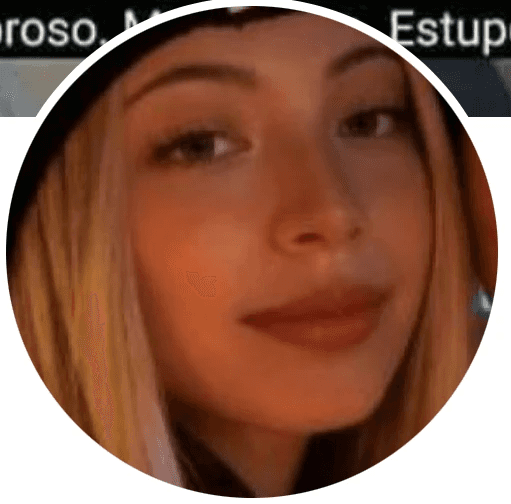 A person on a cozy studio smiling