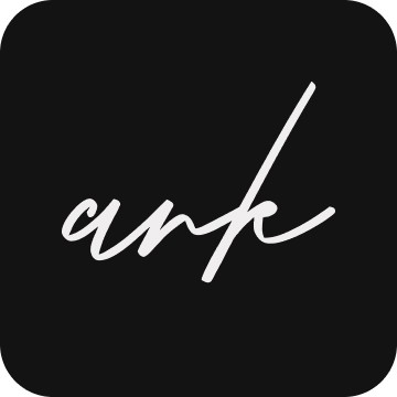 Profile portrait of a man in a grey shirt