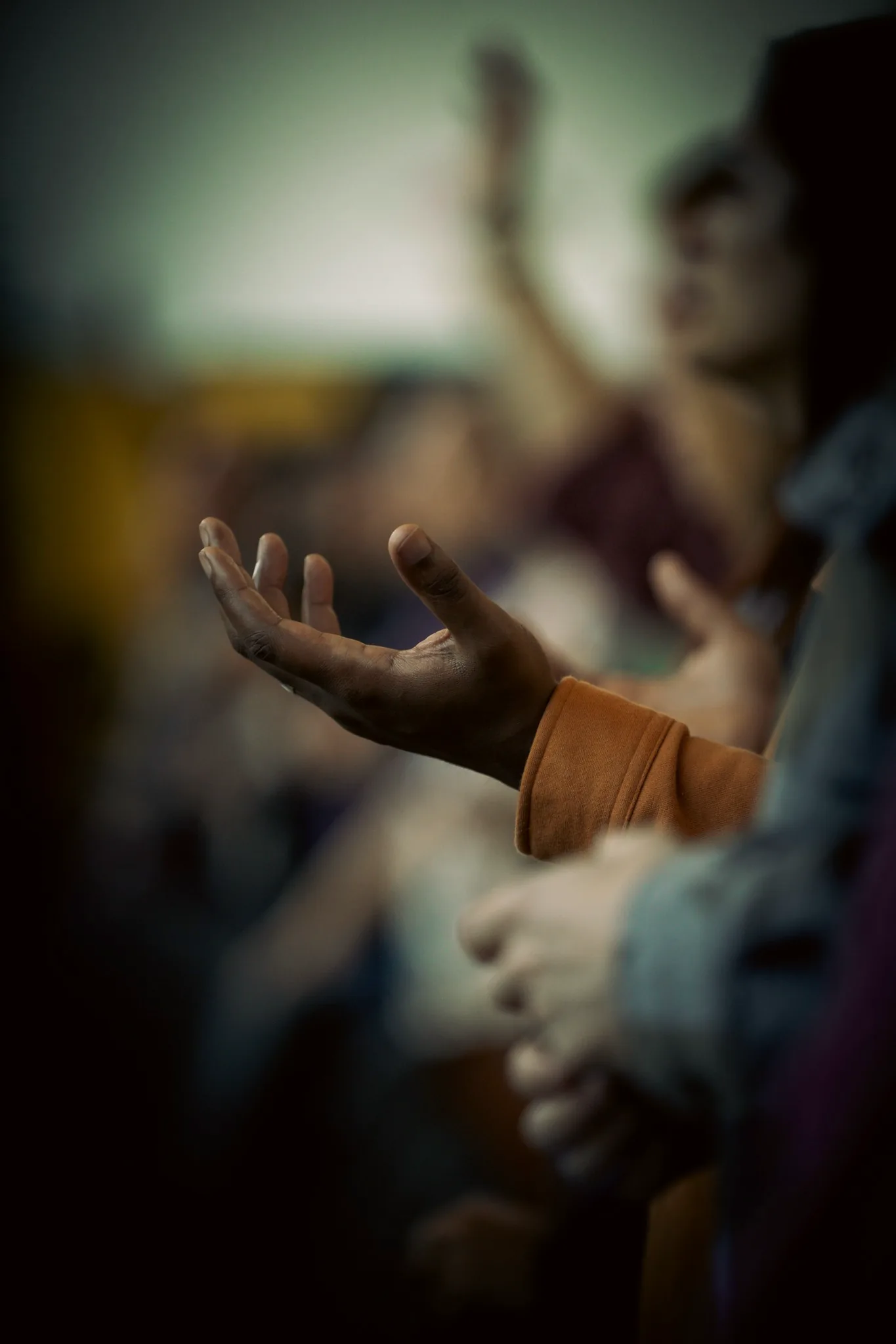 Hand raised during worship