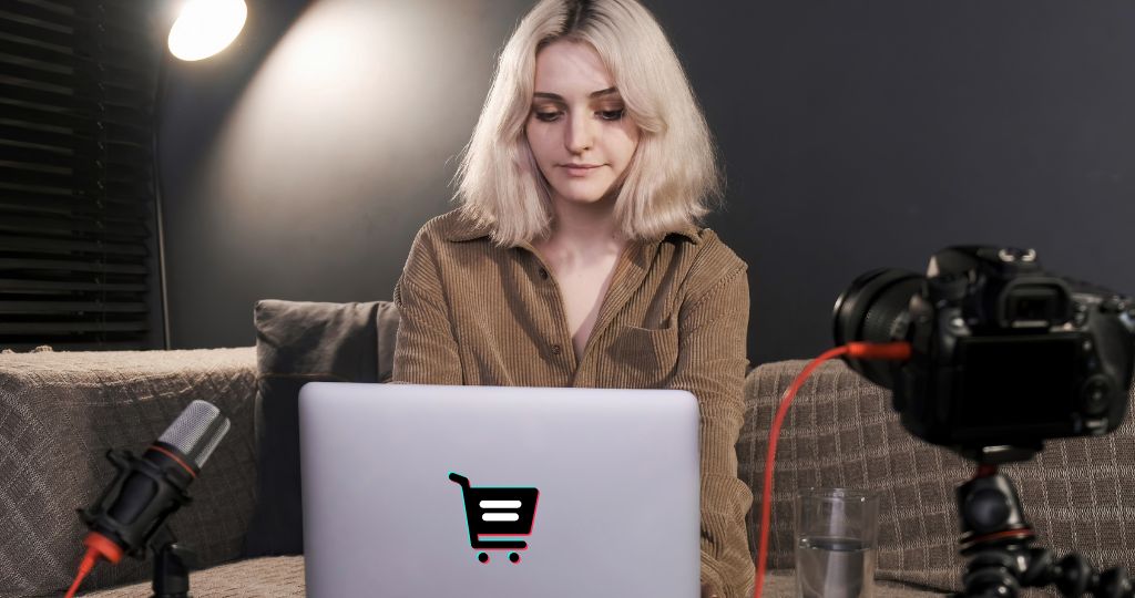 TikTok seller managing her shop on a laptop during a recording session.