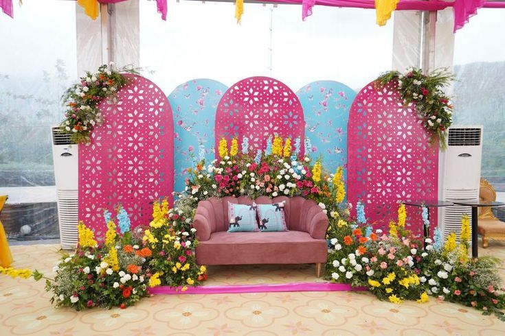 Cheerful Farmhouse Haldi setup in fresh flowers & pastel vibes, ideal for terrace decor in Pitampura, Dwarka & Rohini, Delhi.