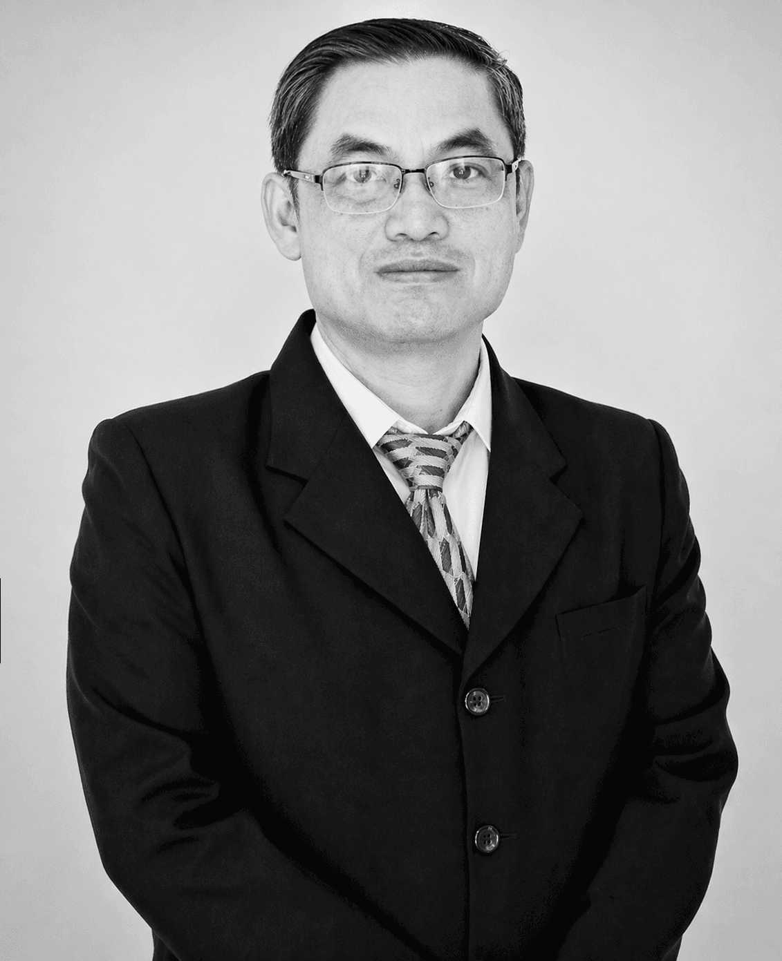 Portrait of a man with glasses and beard