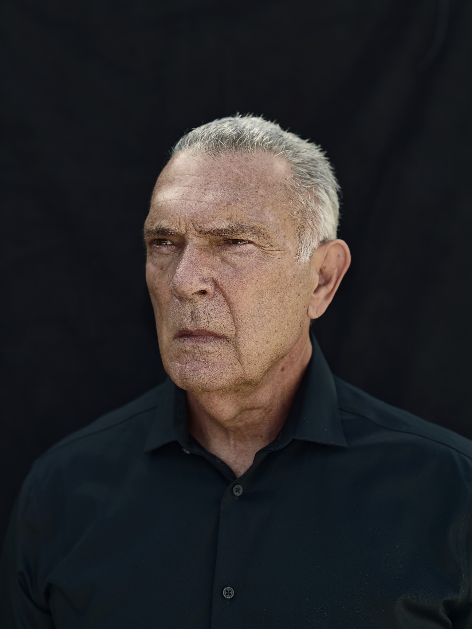 An editorial portrait of former red sox baseball player Bernie Carbo by new orleans based photographer Craig Mulcahy. The image has a moody but natural feel. 