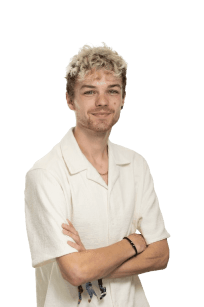 Professinal headshot of a male with blonde, curly hair.