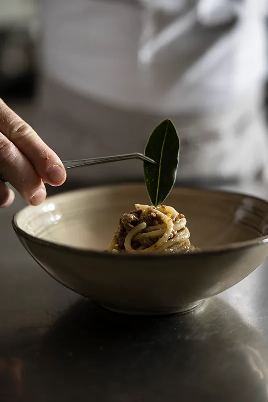 a person is peeling a banana on a machine
