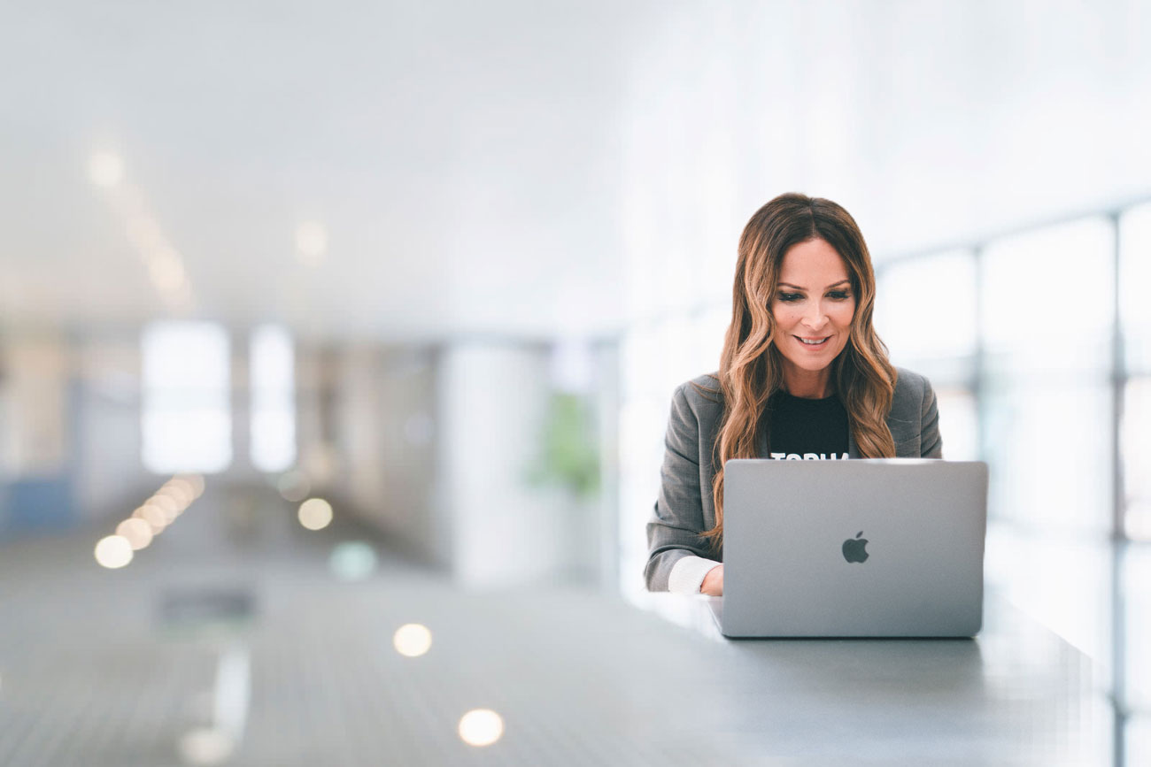 person making a contactless payment with a card