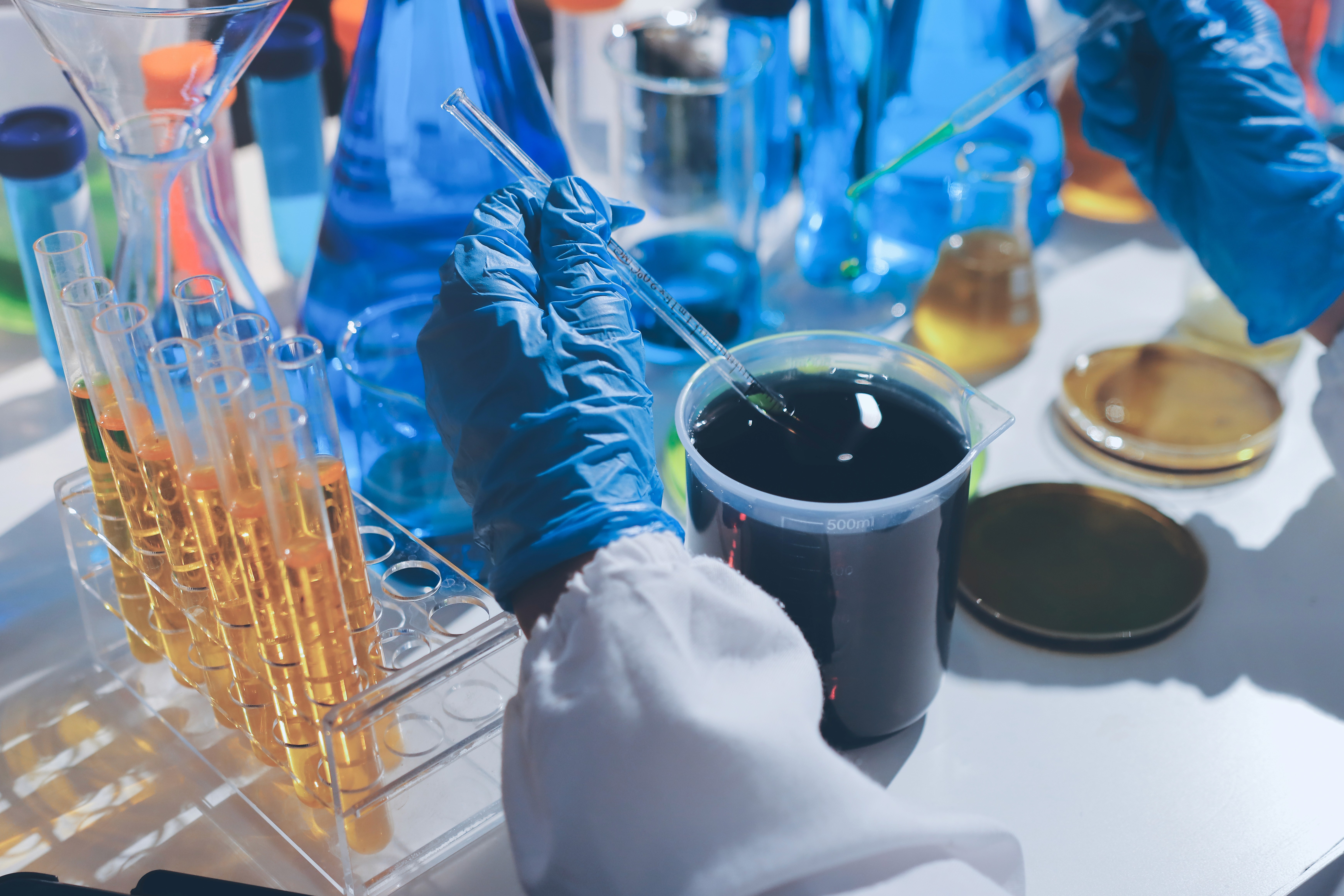A person stands in a sandstone cave.