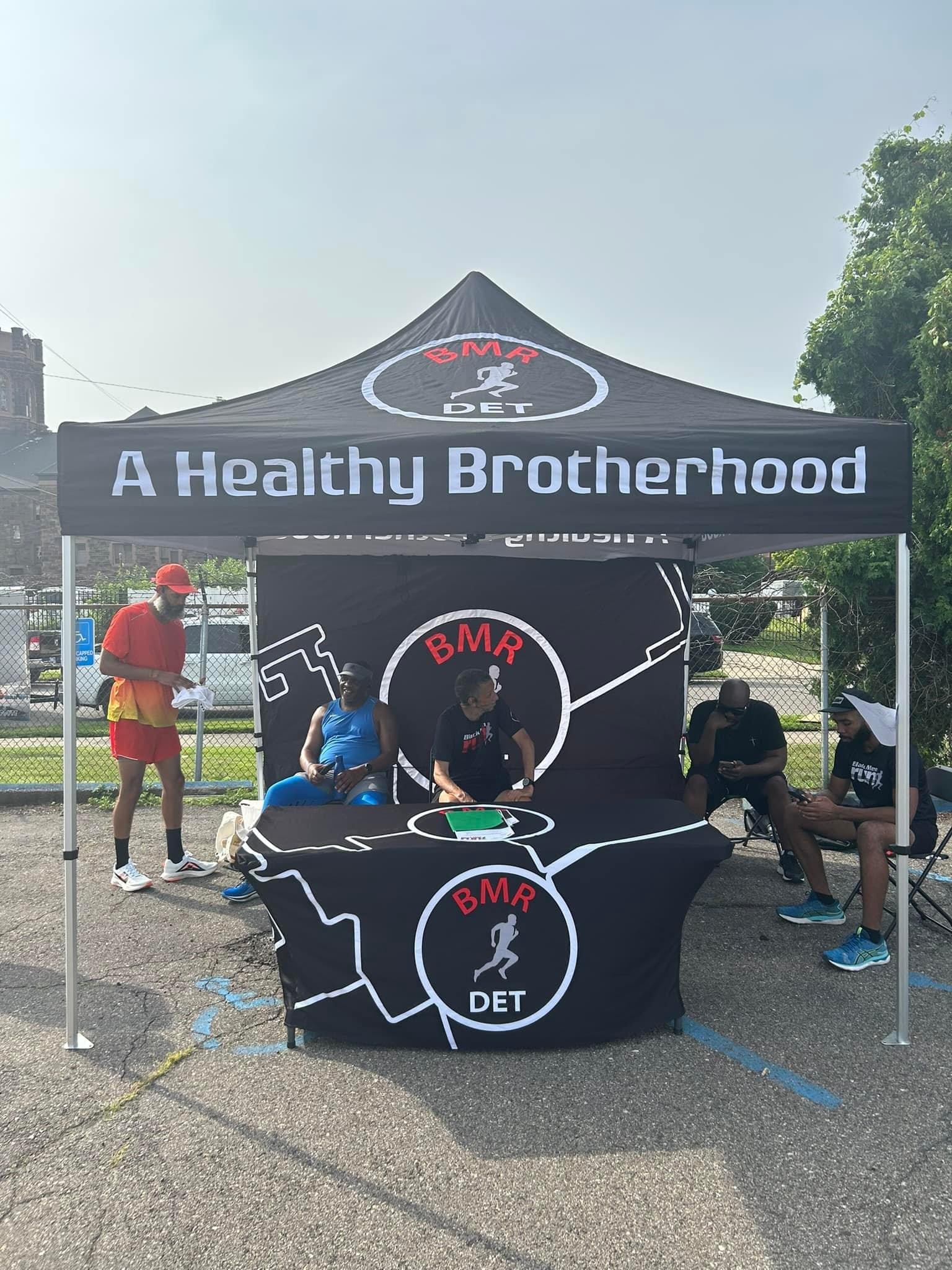 Picture of tent, tent backdrop, and table