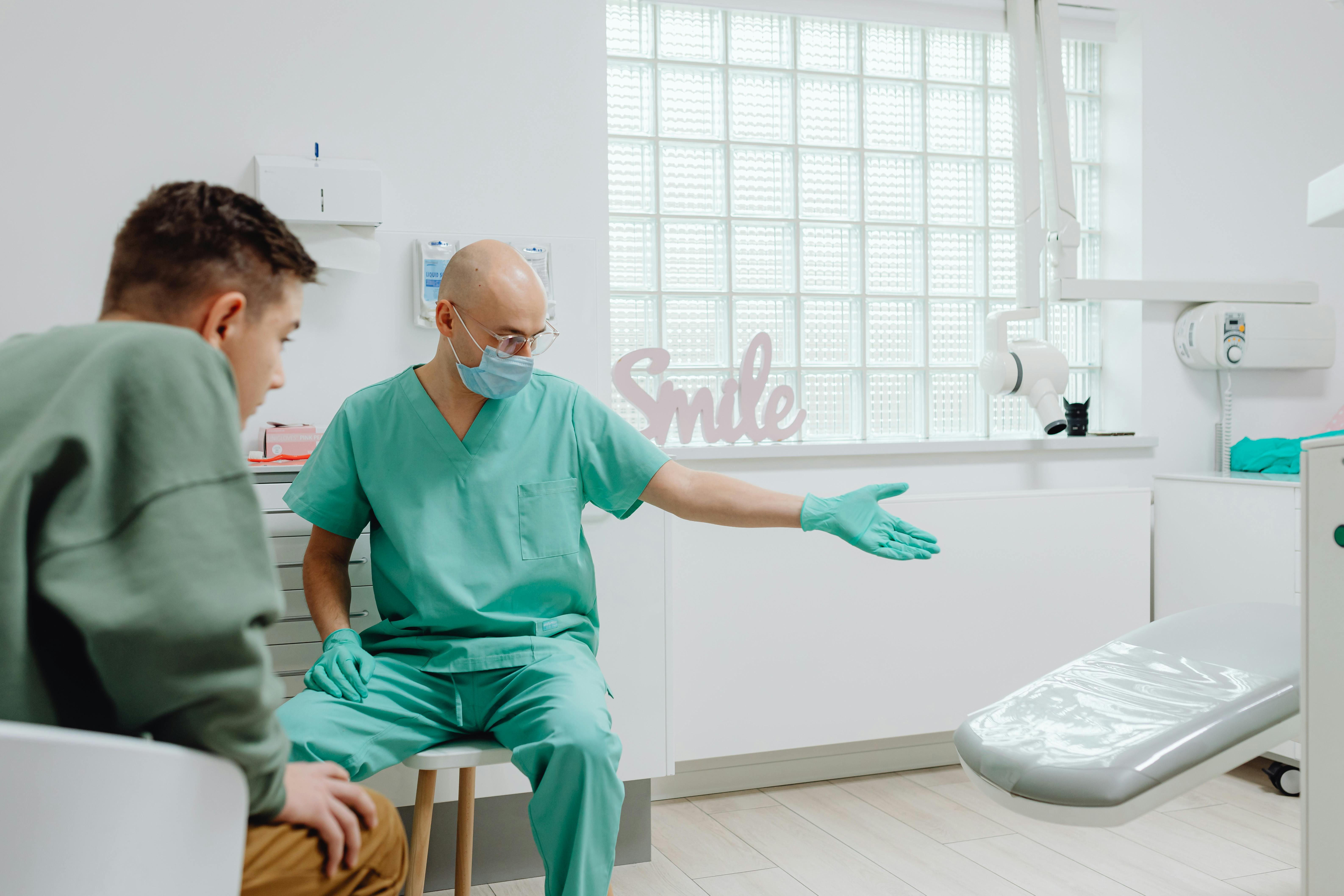 dentist showing patient around operatory