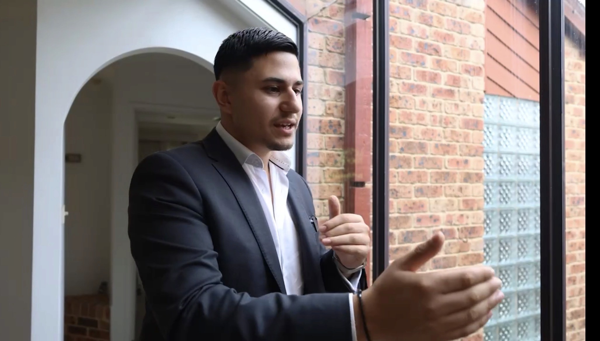 Architectural modern home with sharp lines and car parked outside, Verdant House