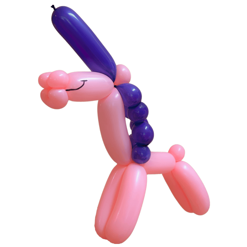 Pink and Purple Unicorn Balloon Animal with drawn face
