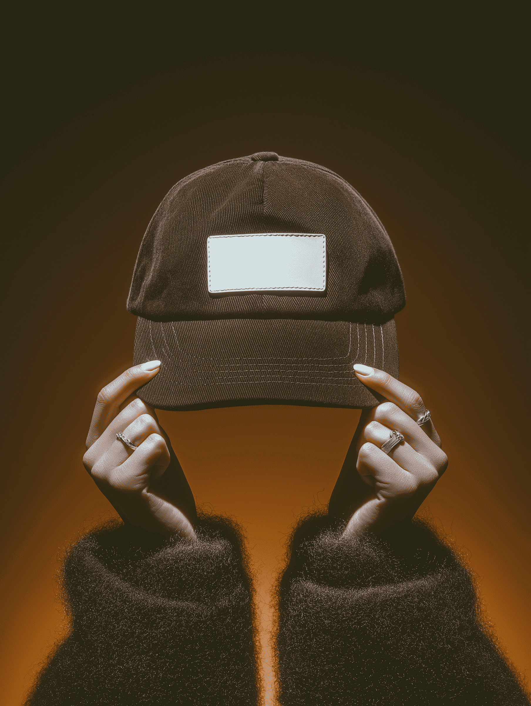 Silhouette of a person in orange clothes walking forward against solid orange backdrop