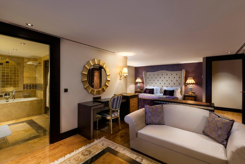 Pool duplex suite with direct pool access and two-level living space.