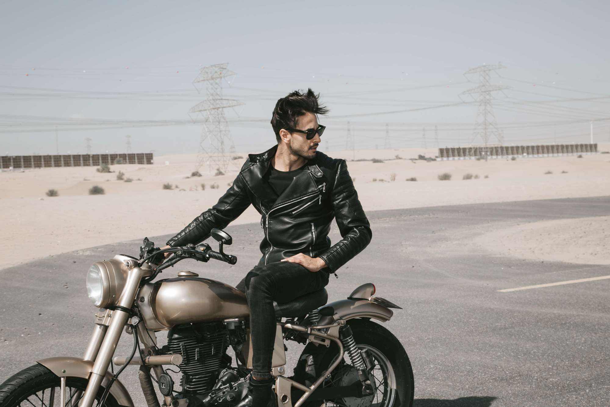 Black and white of a guy on a bike | Bonanza Satrangi’s: Perfume TV Commercial Production | Relity Group