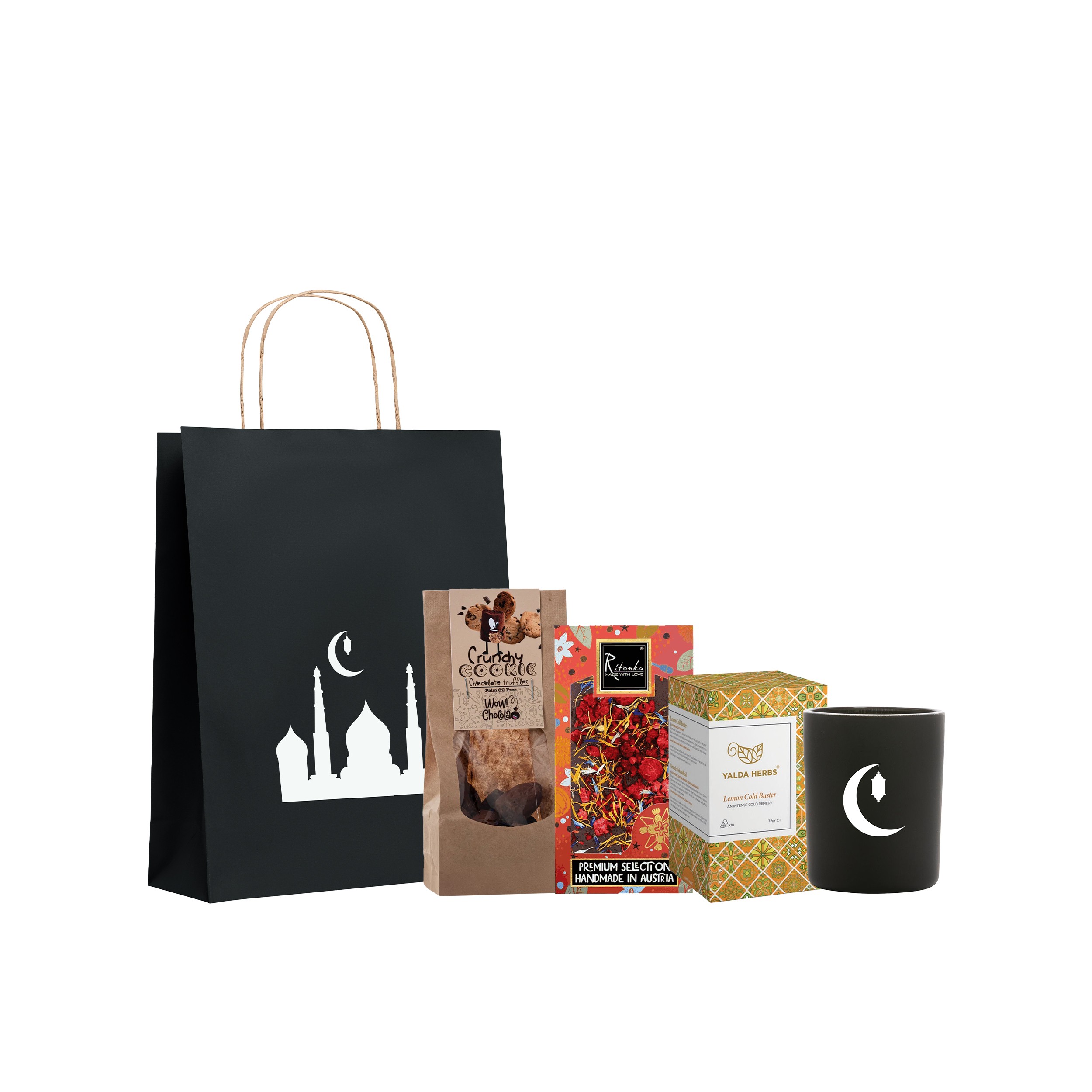 Eid al-Fitr gift set including a bag, cookies, herbal tea box, and a cup