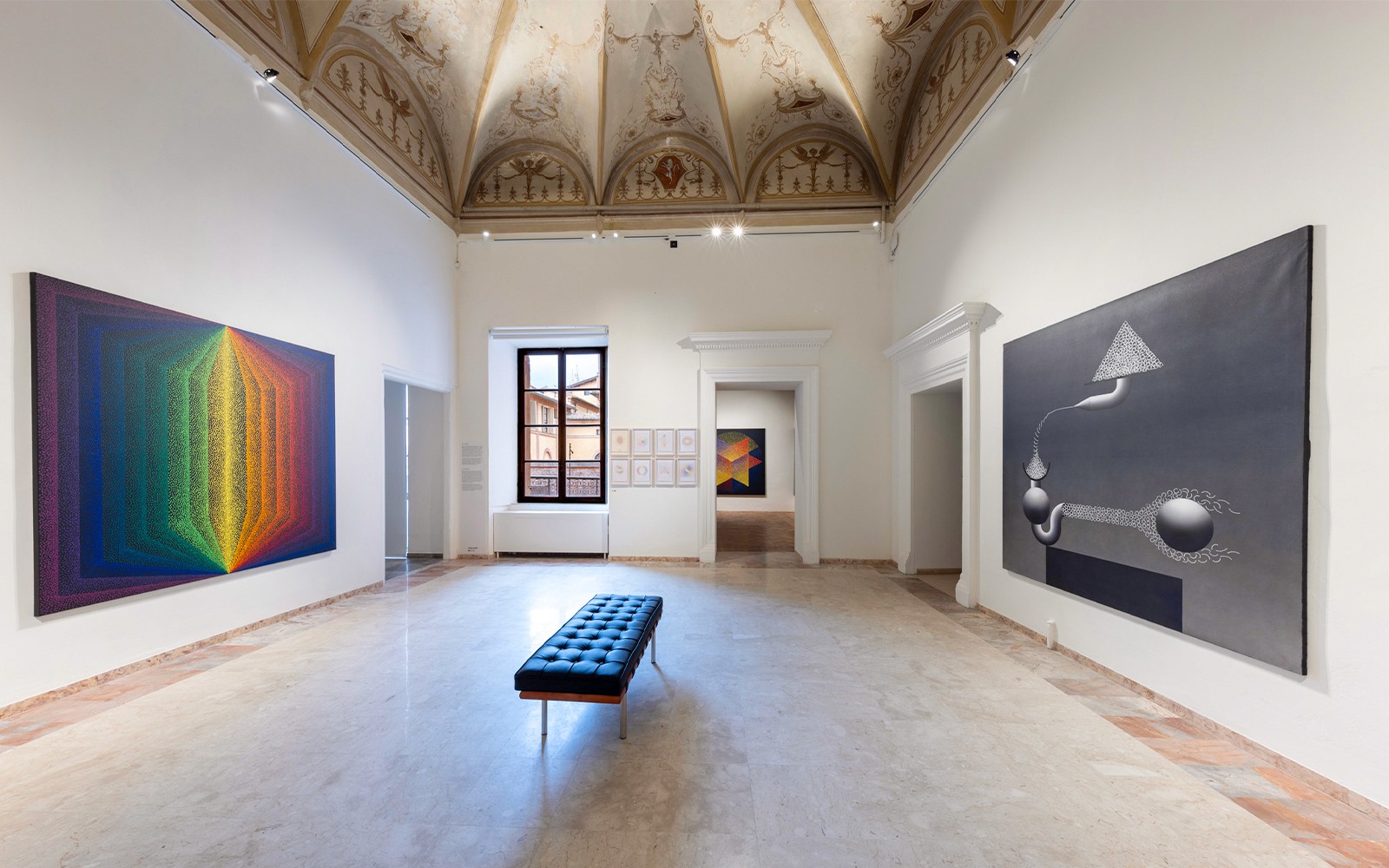 Palazzo delle Papesse exhibition room with modern art paintings on walls.