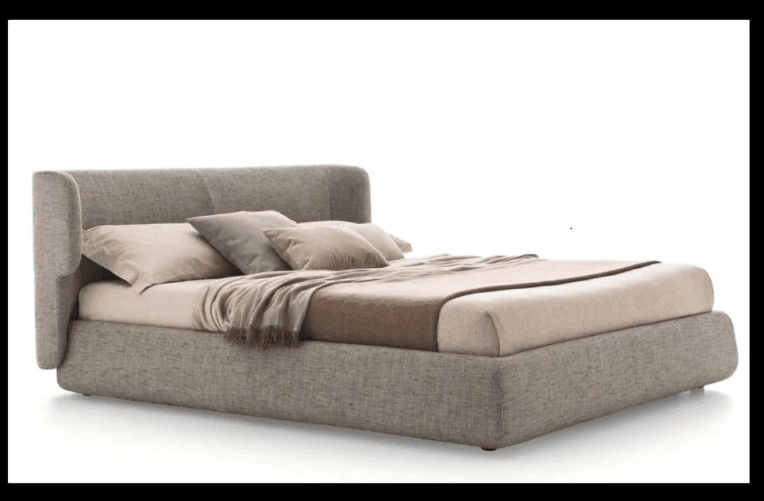 Soft upholstered bed with round edges and cushioned layers.