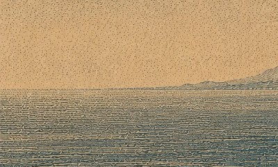 A blurry background image of the sea with some mountains on the horizon.
