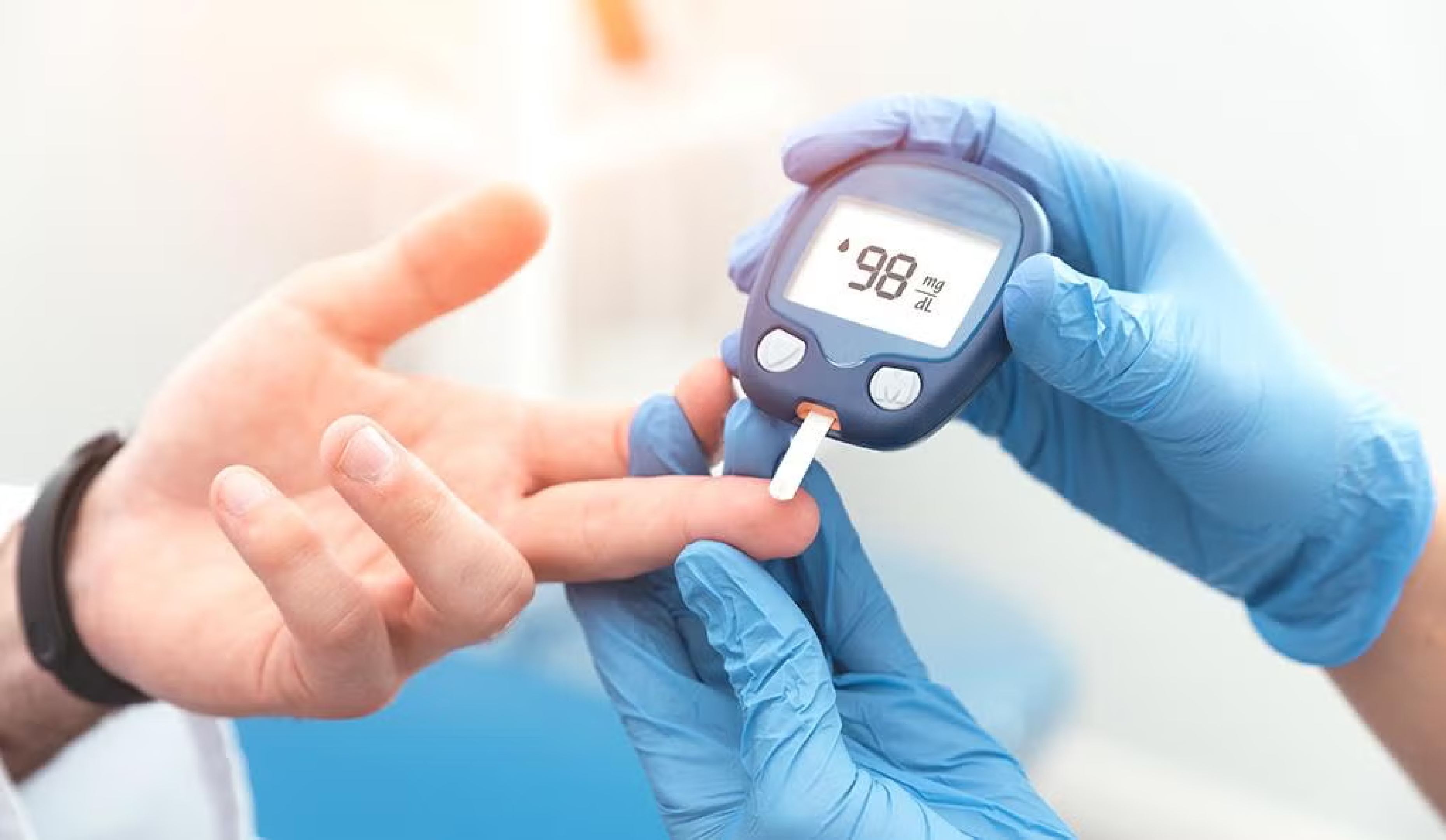 Diabetes patient checking blood sugar levels with a glucometer