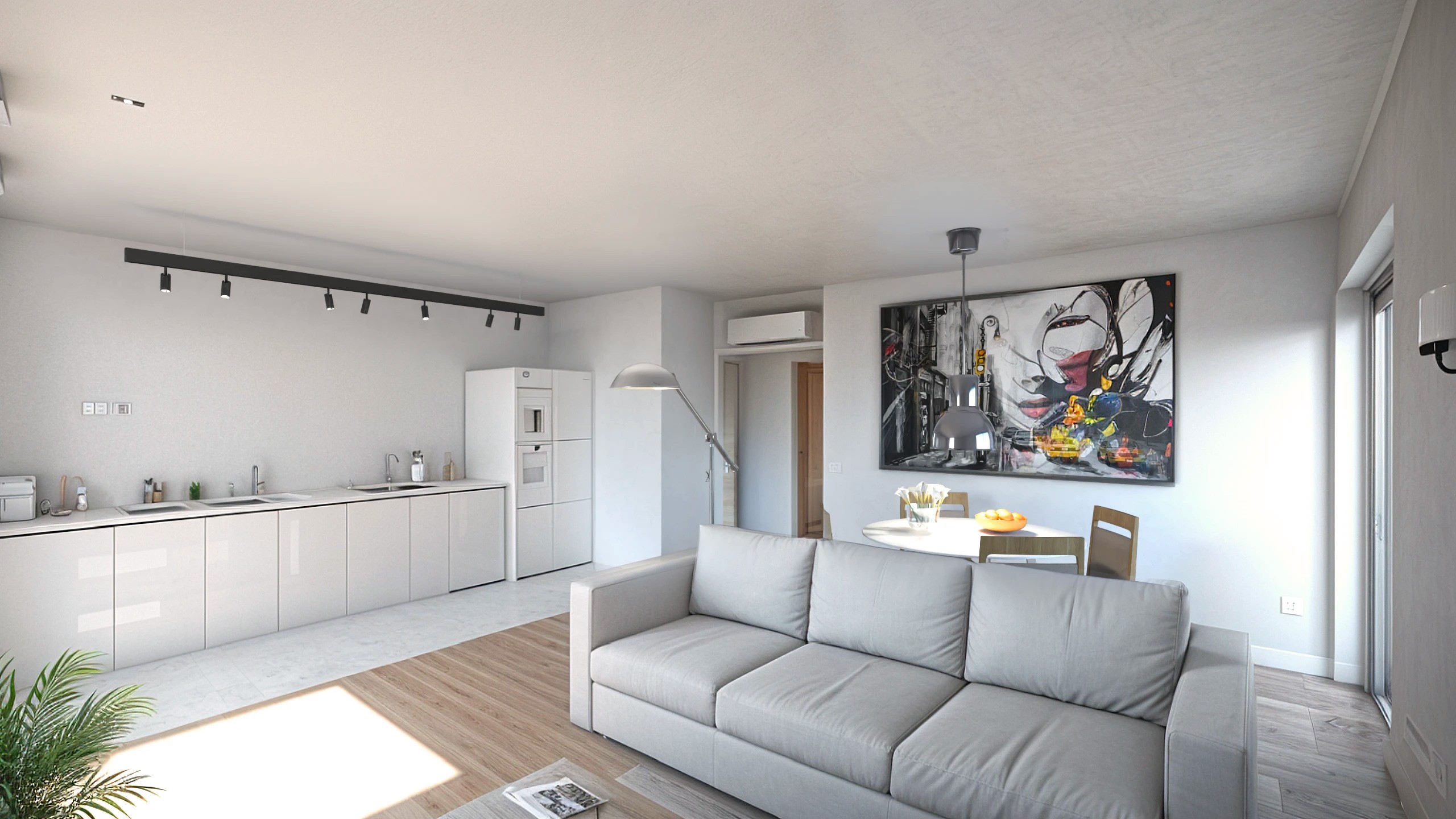 Interior view of a one-bedroom apartment showing a bright living room, kitchen, and dining area with modern furniture for small spaces.