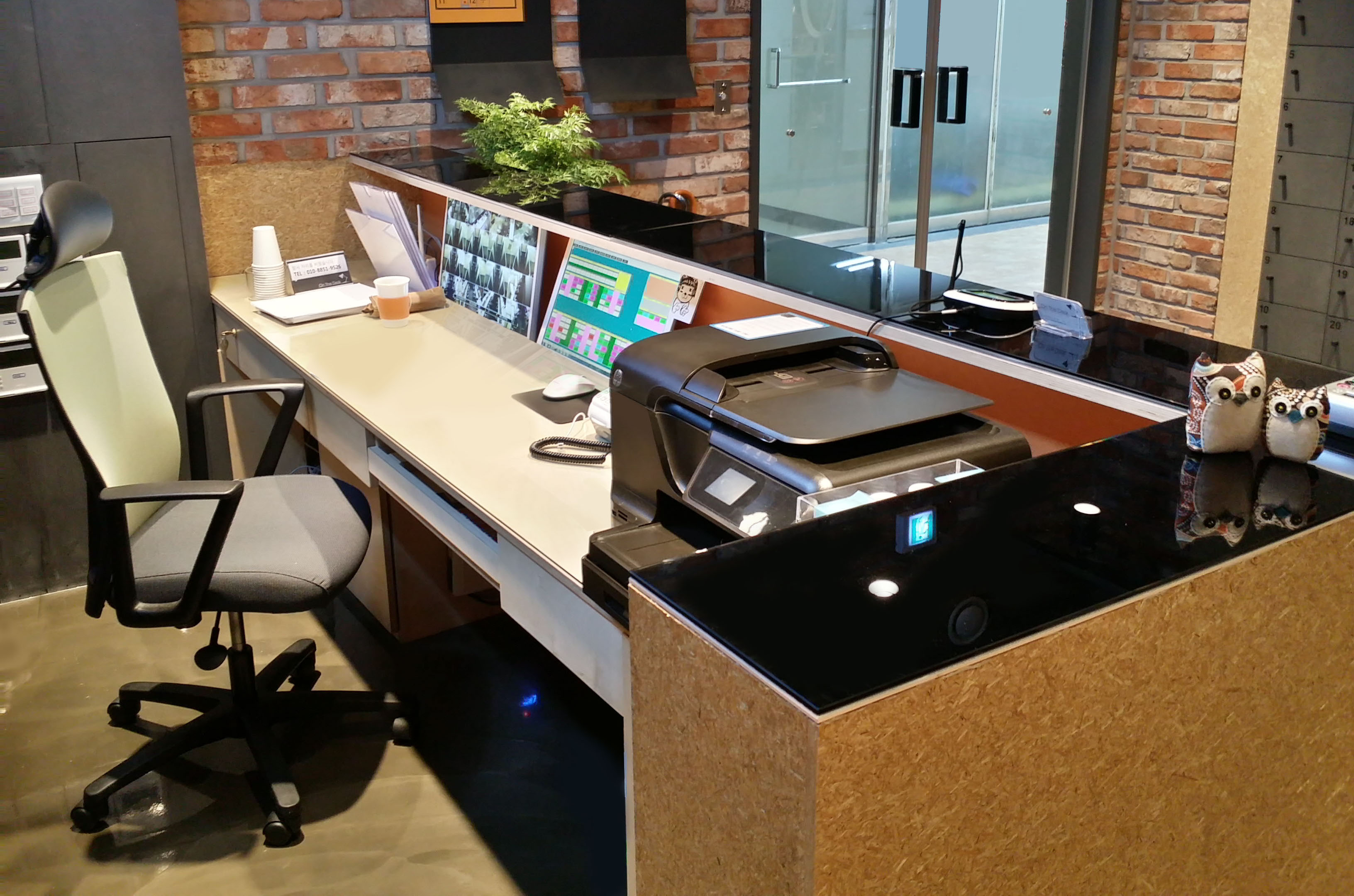 a man sitting in front of a laptop computer
