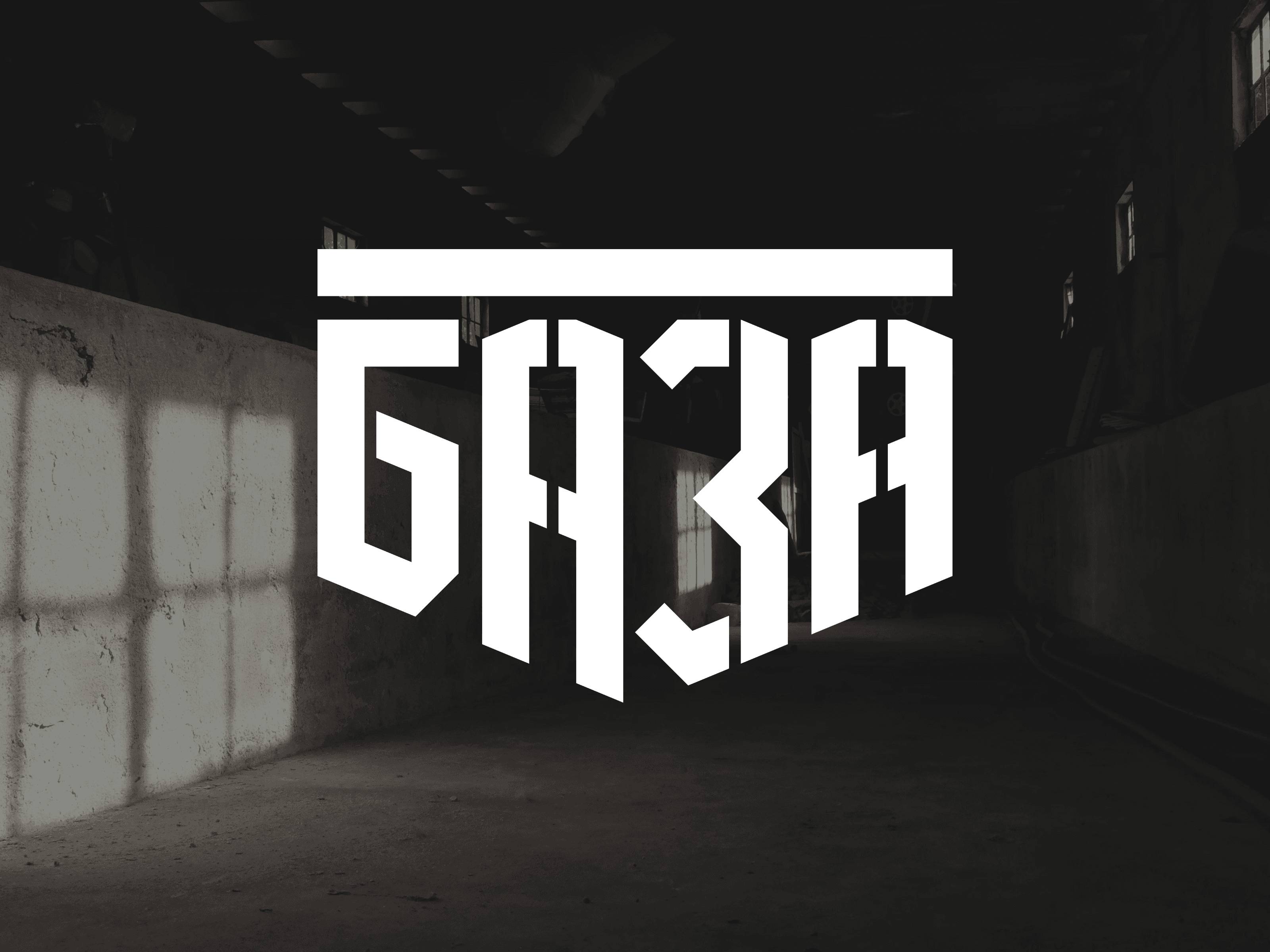 BAZA logo applied in a dark industrial interior, emphasizing strength, scale, and contrast.