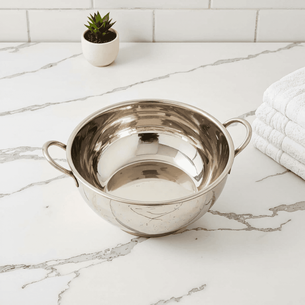 product photography of silver metallic bowl with handles