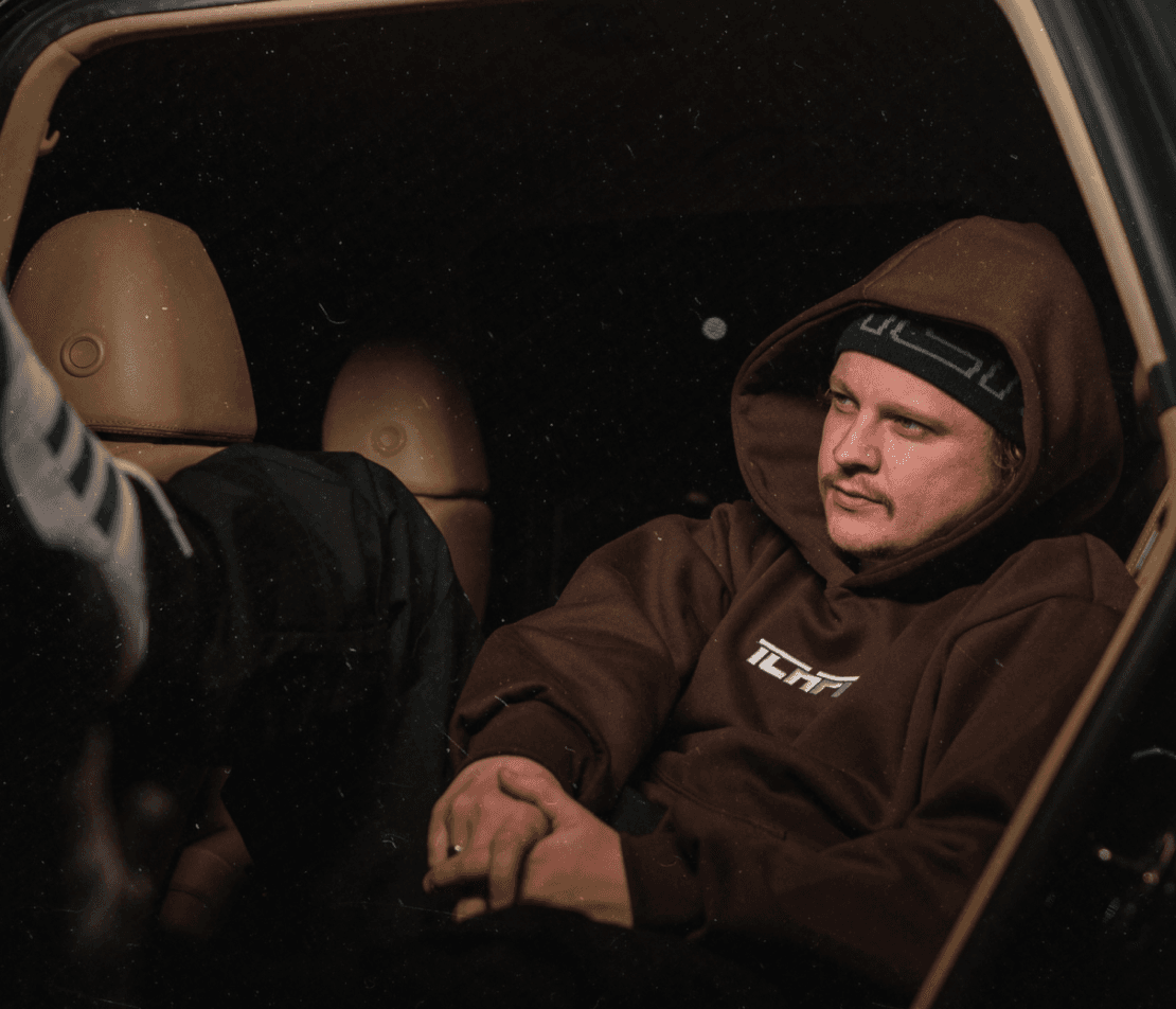 Athlete walking post-run in minimalist fitness photography for supplement brand