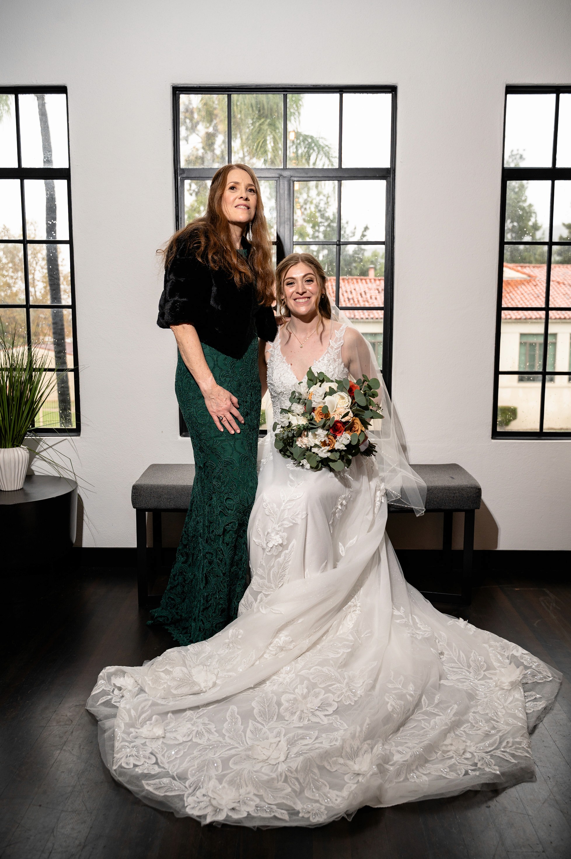 Flat lay wedding details with bouquet, rings, and sparkling bridal heels