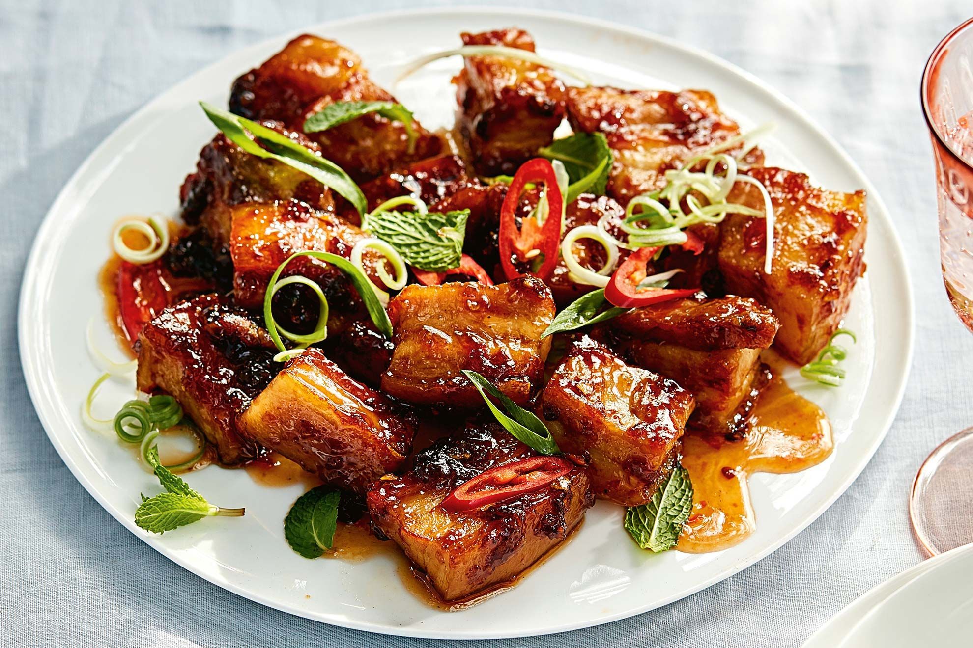 Crispy, caramelised pork pieces coated in a sticky Asian-inspired glaze with the perfect balance of sweetness and heat