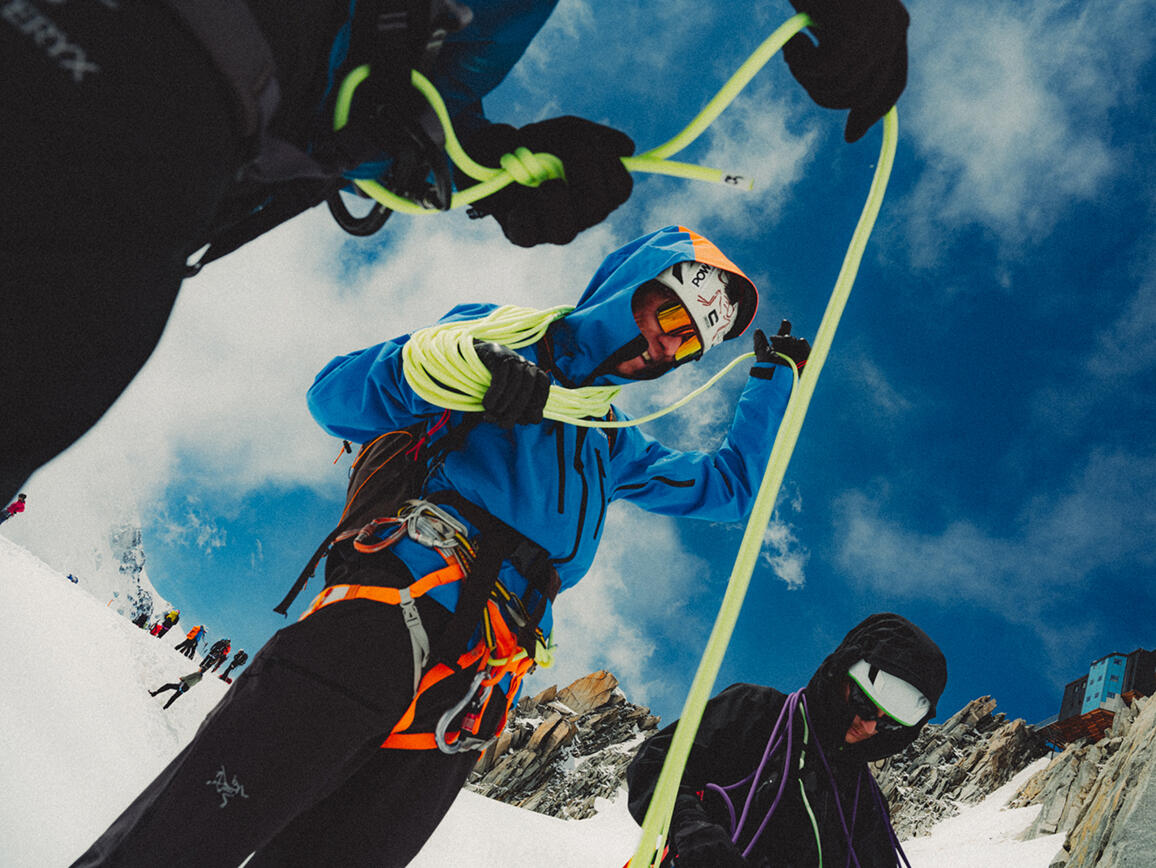 Alpinist in a group of mountaineering course